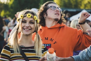 Photo of Woman Smiling Beside Man