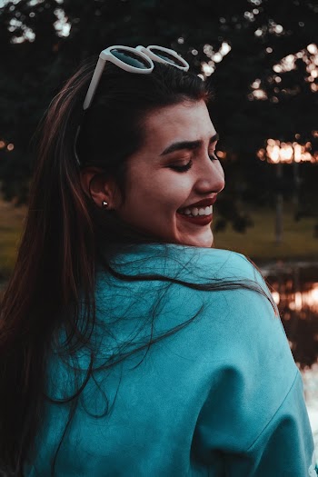 Photo of Woman Smiling With Red Lips
