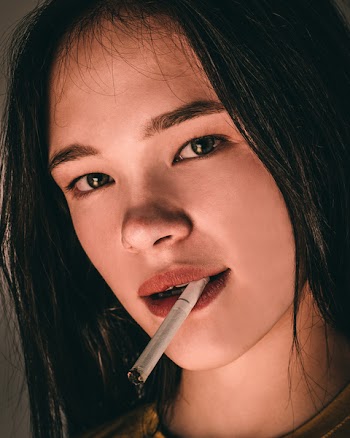 Photo of Woman Smoking Cigarette