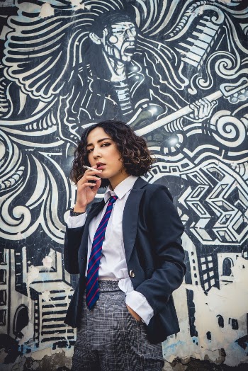 Photo Of Woman Smoking Cigarette
