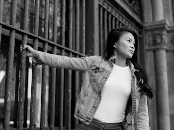 Photo Of Woman Standing Beside Gate