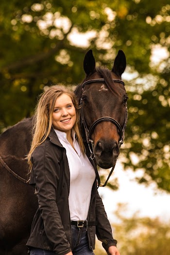 Photo of Woman Standing Beside Horse