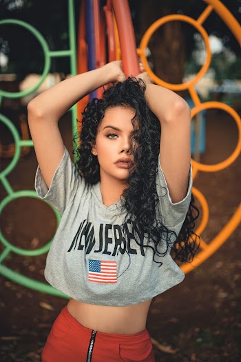 Photo Of Woman Standing In Playground 