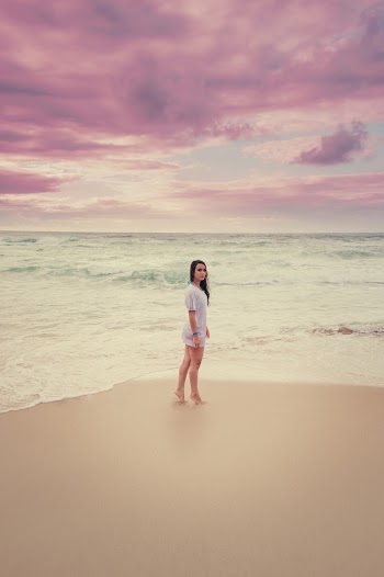 Photo Of Woman Standing In The Shore