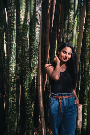 Photo of Woman Standing Near Bamboo Trees