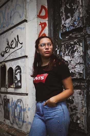 Photo Of Woman Standing Near Door
