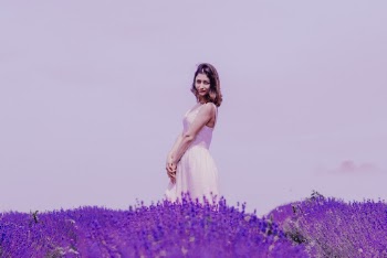 Photo of Woman Standing Near Lavender Field