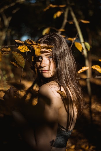 Photo Of Woman Standing Near Plants