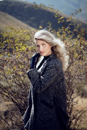 Photo of Woman Standing Near Shrub