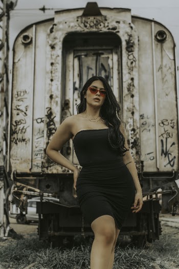 Photo of Woman Standing Near Train