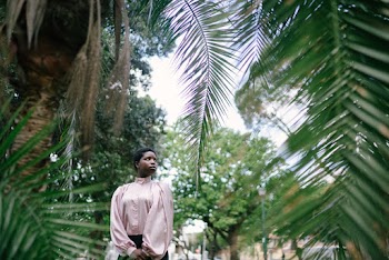 Photo Of Woman Standing Near Trees