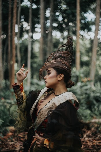 Photo Of Woman Standing Near Trees