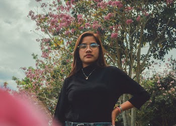 Photo of Woman Standing Near Trees