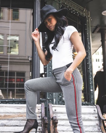 Photo Of Woman Standing On Bench