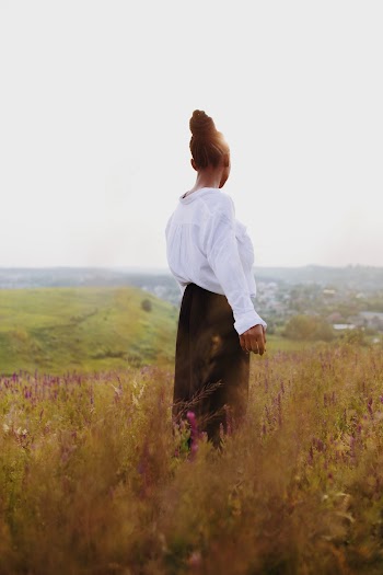 Photo of Woman Standing On Field