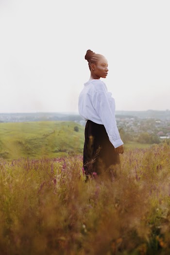 Photo of Woman Standing On Field