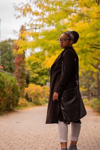 Photo of Woman Standing on Pathway