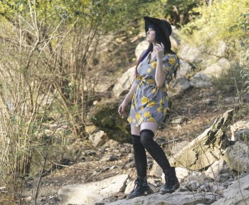 Photo of Woman Standing On Rock