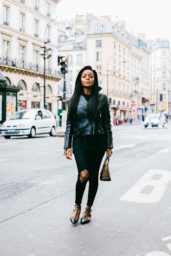 Photo of Woman Standing on Sidewalk