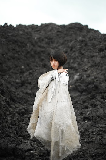 Photo of Woman Standing Outdoors