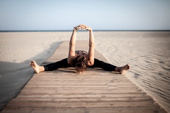 Photo of Woman Stretching Her Arms