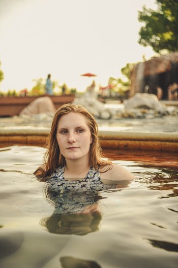 Photo of Woman Swimming in Pool