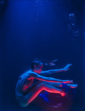 Photo of Woman Swimming Underwater