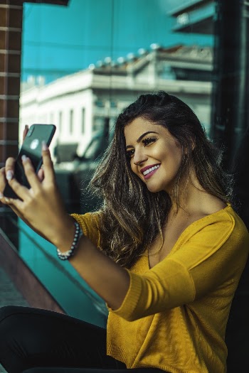 Photo Of Woman Taking Photo 