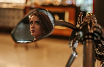 Photo of Woman Taking Photo at Mirror