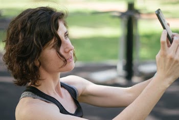 Photo Of Woman Taking Picture