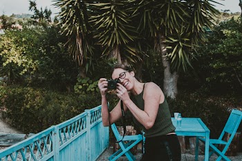 Photo of Woman Taking Picture