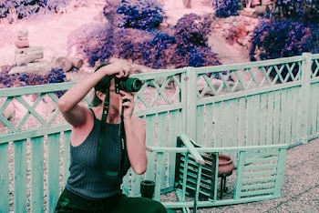 Photo Of Woman Taking Picture