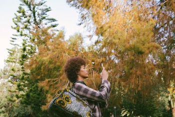 Photo Of Woman Taking Picture