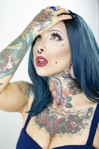Photo of Woman Touching Her Blue Hair