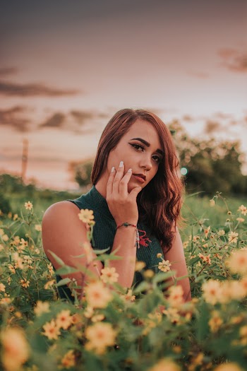 Photo Of Woman Touching Her Face 