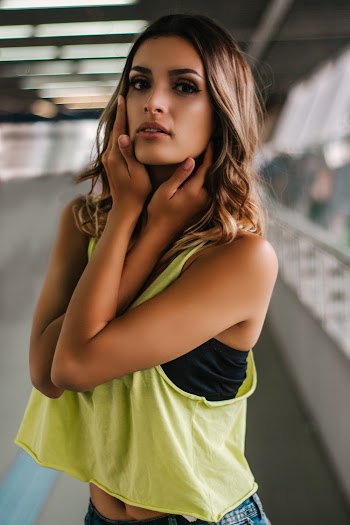 Photo of Woman Touching Her Face