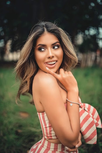 Photo Of Woman Touching Her Face