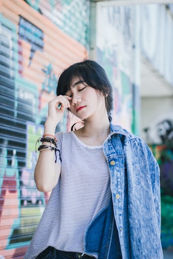 Photo Of Woman Touching Her Face