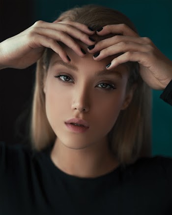 Photo Of Woman Touching Her Forehead