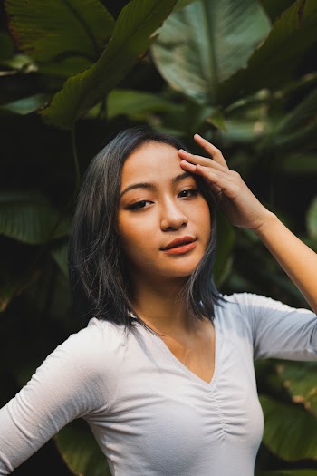 Photo Of Woman Touching Her Forehead