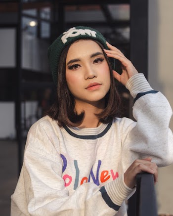Photo Of Woman Touching Her Hair