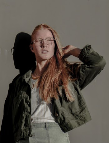 Photo Of Woman Touching Her Hair