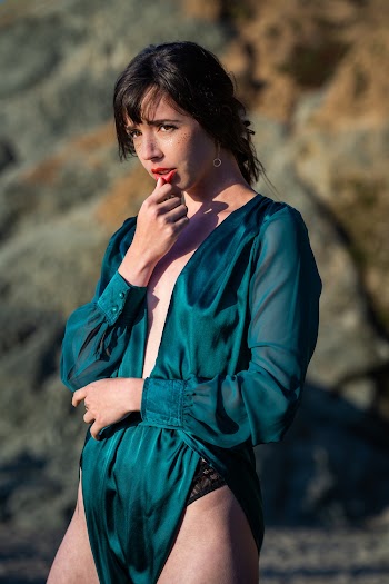 Photo Of Woman Touching Her Lips