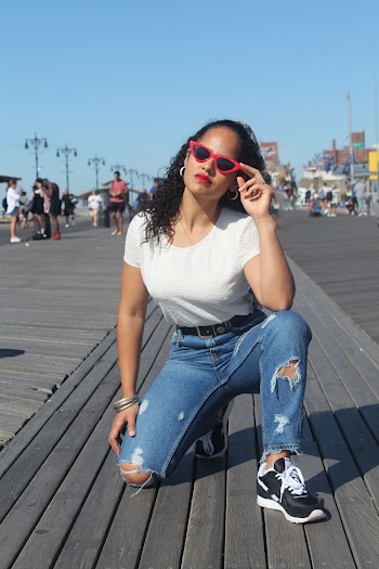 Photo Of Woman Touching Her Sunglasses