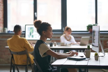 Photo Of Woman Using Computer