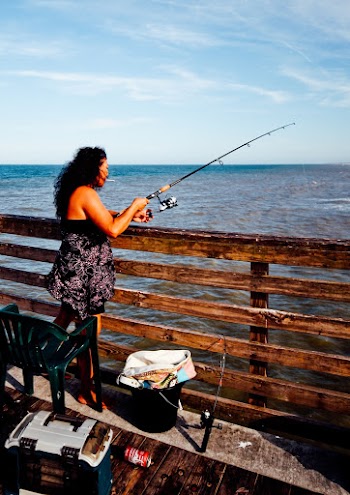 Photo of Woman Using Fishing Rod