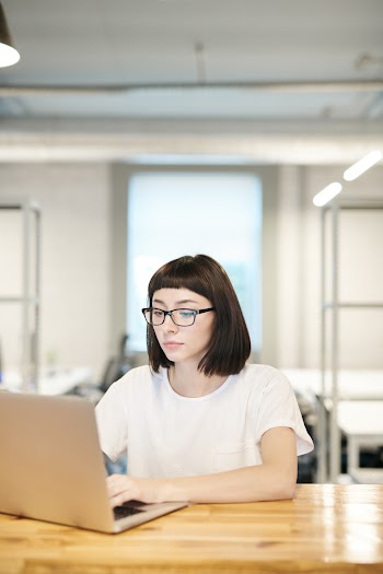 Photo Of Woman Using Laptop