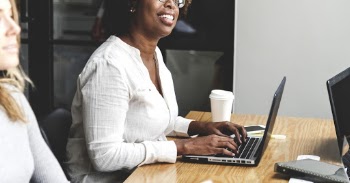 Photo of Woman Using Laptop