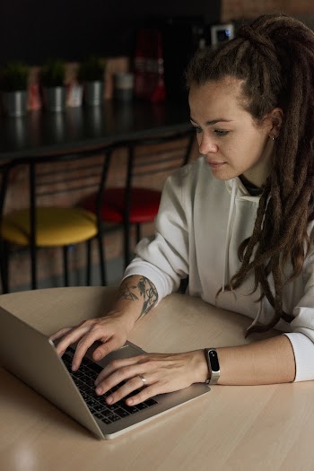 Photo Of Woman Using Laptop