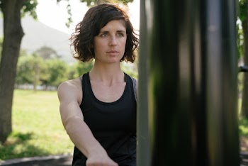Photo Of Woman Using Sports Equipment